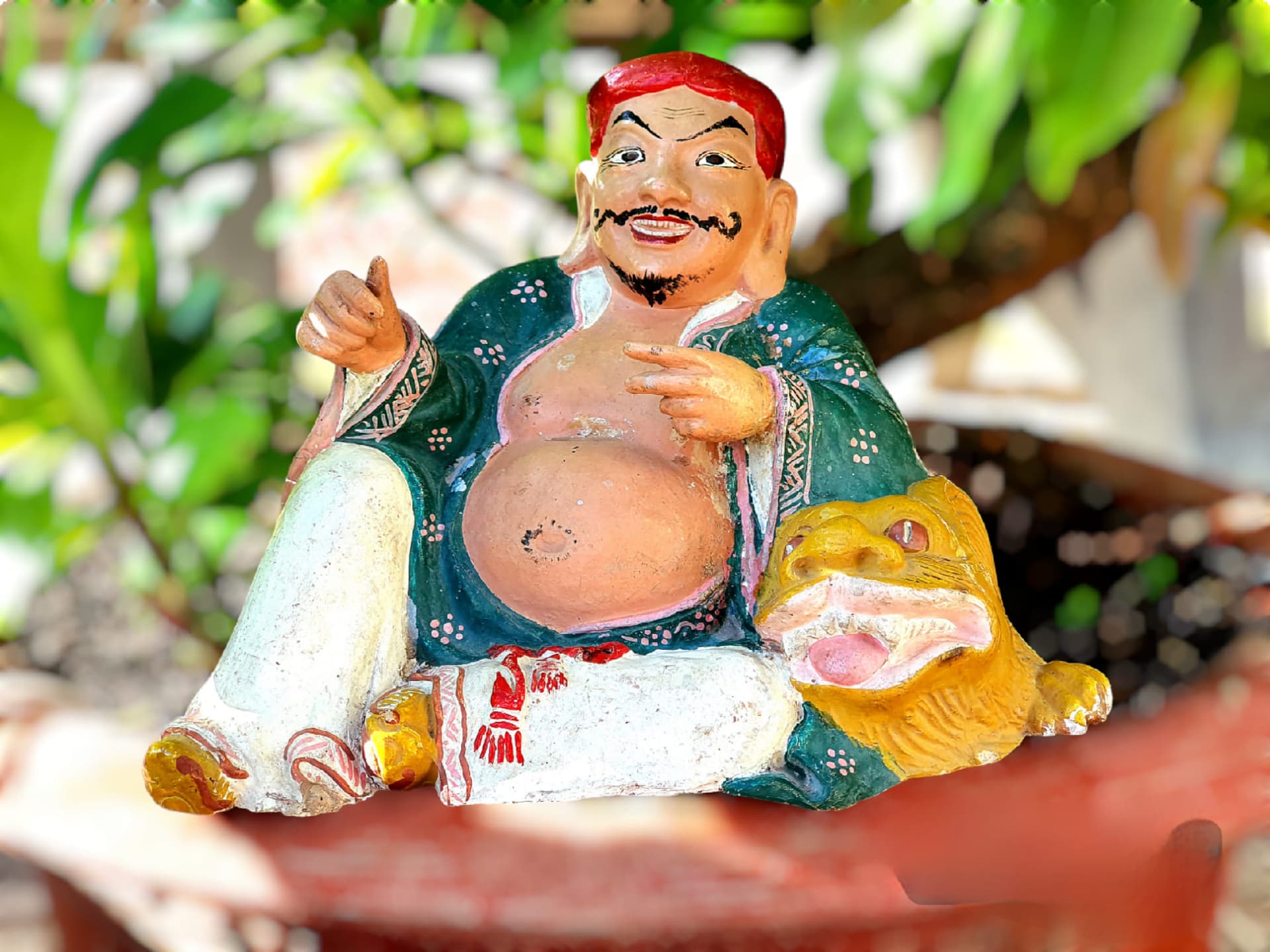 Ông Địa Hỷ Lạc – Tọa Sư Tử